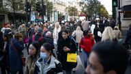  People carry shopping bags during the Black Friday sales on Oxford Street in London, Britain, November 25, 2022. REUTERS/Henry Nicholls/File Photo