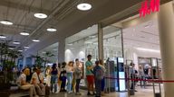 People line up to enter an H&M shop and buy items on sale in the Aviapark shopping mall in Moscow, Russia, Tuesday, Aug. 9, 2022.  
PIC:AP