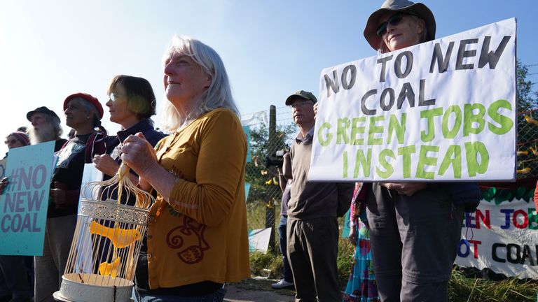 Demonstrators outside the proposed Woodhouse Colliery, south of Whitehaven, ahead of the public inquiry into controversial plans for a new deep coal mine on the Cumbria coast. Picture date: Tuesday September 7, 2021.