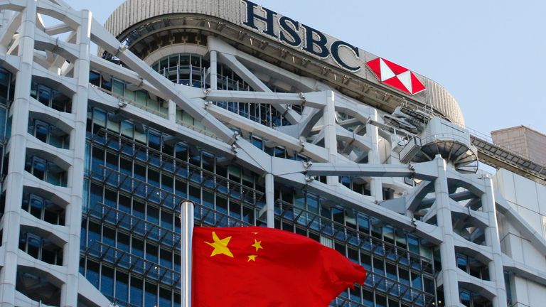 A Chinese national flag flies in front of HSBC headquarters in Hong Kong, China, July 28, 2020