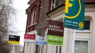 A row of letting agent signs placed outside houses. Around one in seven private renters in England have been hit by a rent hike in recent weeks, according to Shelter.  