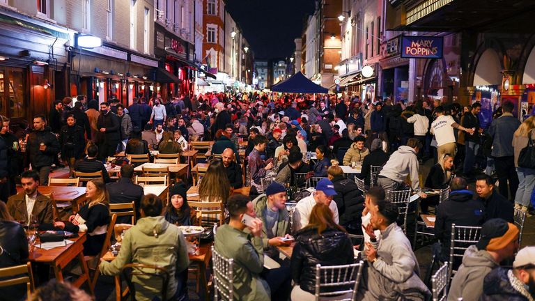 People enjoying a night out in London's West End