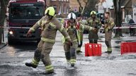 Emergency services on Belsize Road in Camden after a burst water main flooded the London street. London Fire Brigade (LFB) said eight fire engines and around 60 firefighters were called to Belsize Road at 2.50am on Saturday morning after a 42-inch water main burst, causing flooding to a depth of half a metre across an area of around 800 metres. Picture date: Saturday December 17, 2022.

