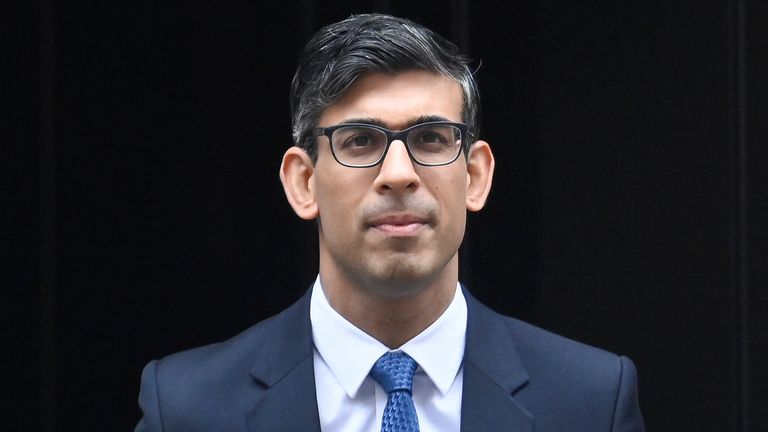 Rishi Sunak looks on outside Number 10 Downing Street
