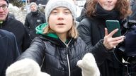 Climate activist Greta Thunberg gestures as she walks outside during the World Economic Forum in Davos (WEF) in Davos, Switzerland January 19, 2023