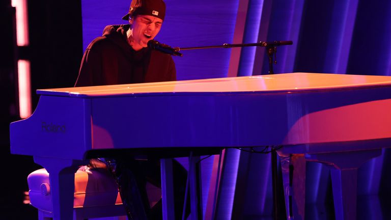 Justin Bieber performs his song "Peaches" during the 64th Annual Grammy Awards show in Las Vegas, Nevada, U.S. April 3, 2022. REUTERS/Mario Anzuoni