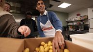 Prime Minister Rishi Sunak prepares and serves breakfast as he visits The Passage homeless shelter 