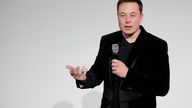 Elon Musk, CEO of Tesla Motors Inc., talks about the Model X car at the company's headquarters  Tuesday, Sept. 29, 2015, in Fremont, Calif.  (AP Photo/Marcio Jose Sanchez)