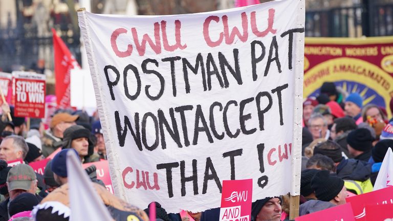 Members of the Communication Workers Union (CWU) hold a rally in Parliament Square, London, as Royal Mail workers mark another strike in the increasingly bitter dispute over jobs, pay and conditions. Picture date: Friday December 9, 2022.