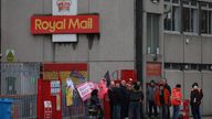  Postal workers stand on a picket line during a strike outside a sorting office in Liverpool