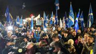 People attend a rally outside the Scottish Parliament in Edinburgh following the decision by judges at the UK Supreme Court in London that the Scottish Parliament does not have the power to hold a second independence referendum 