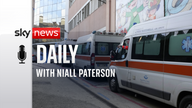 Ambulances are parked outside a ward hosting COVID-19 patients the Bambino Gesu pediatric hospital in Rome, Jan. 11, 2022. (AP Photo/Alessandra Tarantino)