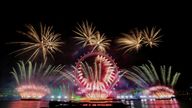 Fireworks explode over the London Eye ferris wheel as Britons across the country welcome the New Year, in London, Britain, January 1, 2023. REUTERS/Maja Smiejkowska