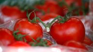 Tomatoes are seen for sale on a fruit and vegetable stall at Alsager market, Stoke-on-Trent, Britain, August 7, 2019. REUTERS/Andrew Yates