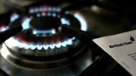 File photo of a gas hob with a bill from supplier British Gas