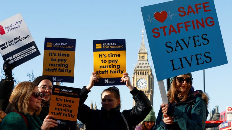 Nurses protest during a strike by NHS medical workers, amid a dispute with the government over pay, outside St Thomas' Hospital, in London, Britain, February 6, 2023. REUTERS/Peter Nicholls