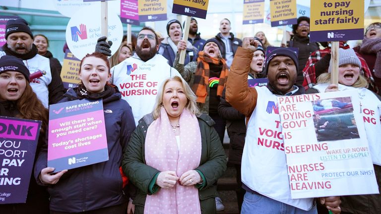 Pat Cullen (centre) joins RCN members on the picket line 