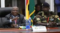 ECOWAS commissioner Abdel-Fatau Musah, centre, speaks during a press briefing following the Extraordinary Meeting of the ECOWAS Committee of Chiefs of the Defence Staff, in Accra, Ghana, Friday, Aug. 18, 2023. Musah announced the ECOWAS forces are ready to act and intervene in Niger should all options fail At left is Nigerian Chief of Defence Staff General Christopher Gwabin Musa, and right is Senegal's General Mbaye Cisse. (AP Photo/Richard Eshun Nanaresh)