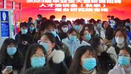 Mask-clad students look for employment opportunities at a job fair on a local campus of China Agricultural University. Pic: AP