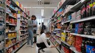 FILE - Shoppers buy food in a supermarket in London, Wednesday, Aug. 17, 2022. Official figures show that inflation in the U.K. has fallen to its lowest level since the immediate aftermath of Russia...s invasion of Ukraine which caused energy and food costs to surge. The Office for National Statistics said Wednesday that the consumer price index dropped to 8.7% in the year to April from 10.1% in March. (AP Photo/Frank Augstein, File)