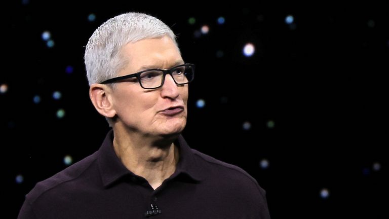 Apple CEO Tim Cook presents the new iPhone 14 at an Apple event at their headquarters in Cupertino, California, U.S. September 7, 2022. REUTERS/Carlos Barria