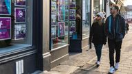 People walk past a branch of Chestertons estate agents in Islington, London, Britain, December 10, 2021. Picture taken December 10, 2021. REUTERS/May James