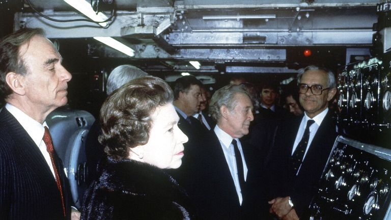 Murdoch and the late Queen Elizabeth II watching The Times go to press in 1985 in a royal visit to mark the newspaper's bicentenary Pic: AP 