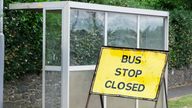 A bust stop with a closed sign