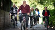 Sir Ed Davey alongside West Country MPs and key candidates as they arrive by bicycle for the Liberal Democrat conference in Bournemouth