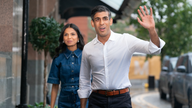 Rishi Sunak and his wife Akshata Murty arriving in Manchester