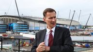 British Chancellor of the Exchequer Jeremy Hunt tours nearby the construction site of the Co-op Live indoor entertainment arena during Britain's Conservative Party's annual conference in Manchester, Britain, October 2, 2023. REUTERS/Toby Melville/Pool