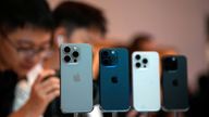 People look at the new iPhone 15 Pro as Apple's new iPhone 15 officially goes on sale across China at an Apple store in Shanghai, China September 22, 2023. REUTERS/Aly Song
