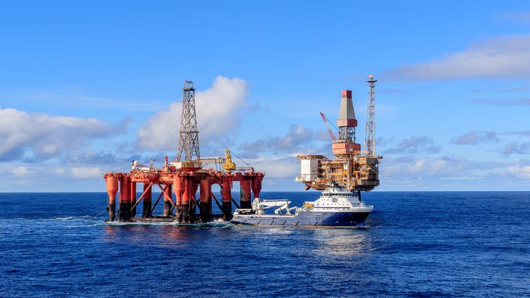 NORTH SEA, UK - 2016 OCTOBER 01. AHTS vessel Island Valiant doing rig move operation for semi submersible rig Borgsten Dolphin next to Dunbar platform.