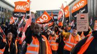 Members of the GMB union on the picket line stand in front of a freight lorry outside the Amazon fulfilment centre in Coventry. Amazon workers will launch a series of strikes on Tuesday in a long-running dispute over pay. Members of the GMB union at the online giant's Coventry site will walk out for three days, and again on November 24 - Black Friday. The union announced that around 1,000 workers will be on strike after criticising a pay offer it said was worth £1 an hour. Picture date: Tuesday 