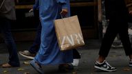 A woman carries a bag from Spanish multinational retail clothing chain Zara, in the Gran Via of Bilbao, Spain, December 11, 2023. REUTERS/Vincent West