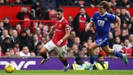 Leicester City's Wout Faes (right) and Manchester United's Bruno Fernandes during a Premier League match at Old Trafford Stadium,