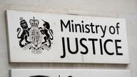 A view of signage for the Ministry of Justice in Westminster, London.
