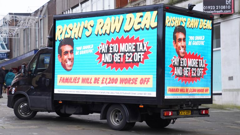 A van in Wellingborough, North Northamptonshire, displaying Labour's poster campaign of what it calls 