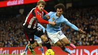 Brentford's Mads Roerslev in action with Manchester City's Oscar Bobb.
Pic: Reuters