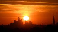 Sunrise above London skyline as second heatwave is predicted for parts of the country, Richmond Park, London