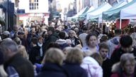 Shoppers on Winchester's High Street on Black Friday. Picture date: Friday November 25, 2022.