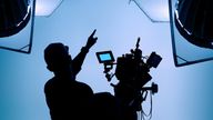 Video or film production studio used in shooting videography or photography and photo sets. Professional movie camera and film crew team making film scenes for cinema TV or online advertising works.