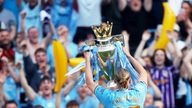 Manchester City's Erling  Haaland celebrates with the trophy after winning the Premier League.
Pic: Reuters