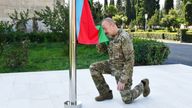 Azerbaijan's President Ilham Aliyev attends a flag raising ceremony in the 