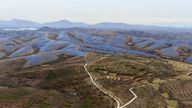 Solar farm operates next to Donggou village near Shijiazhuang city in the northern China's Hebei province, Friday, Nov. 10, 2023. (AP Photo/Ng Han Guan)