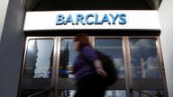 A pedestrian walks past a Barclays Bank branch, in central London August 3, 2009. REUTERS/Stefan Wermuth/File Photo