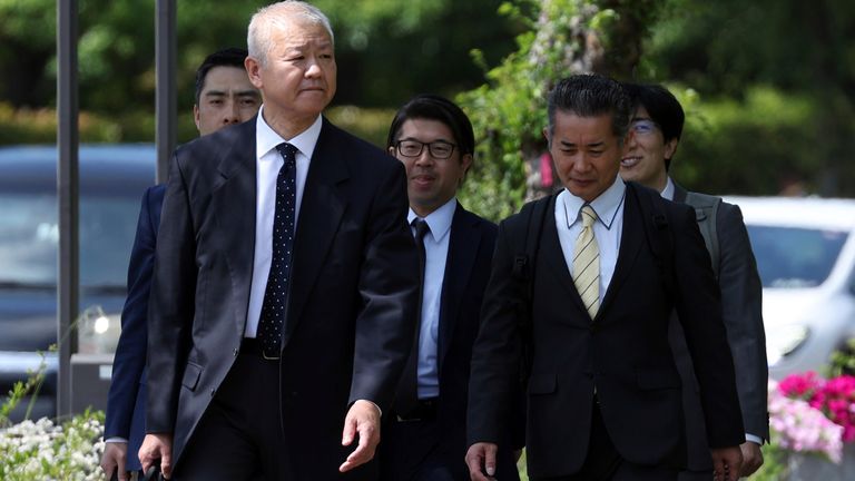 Transport ministry officials enter the Toyota Motor headquarters on Tuesday. Pic: AP