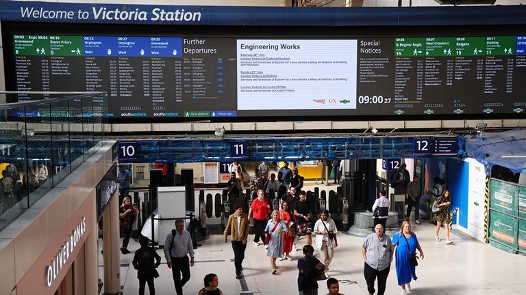 Passengers at Victoria train station, London, amid reports of widespread IT outages affecting airlines, broadcasters and banks. Picture date: Friday July 19, 2024.