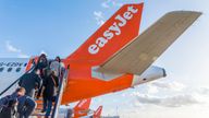 Passengers board an Easyjet airplane at London's Gatwick airport. Pic: iStock