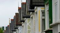 A Wimbledon tennis flag hangs from a lamp post on a residential street, as preparations are underway for the Wimbledon tennis tournament in London, Friday, June 25, 2021. The oldest Grand Slam tennis tournament was the only one that was canceled in 2020 because of the coronavirus pandemic. It was the first time since World War II that Wimbledon was not held. The Championships will start Monday June 28. (AP Photo/Kirsty Wigglesworth)